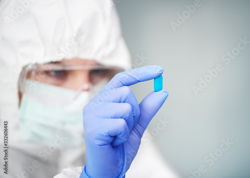 Capsule in hands of a laboratory technician.