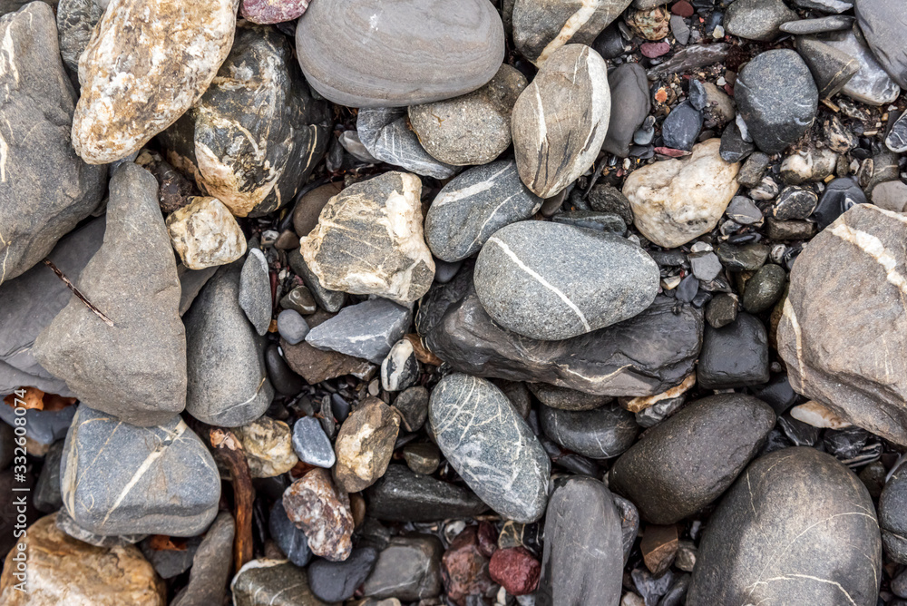 stones and rocks in a water stream in the forest. Pebbles close up stones and rocks in a water stream in the forest. Pebbles close up