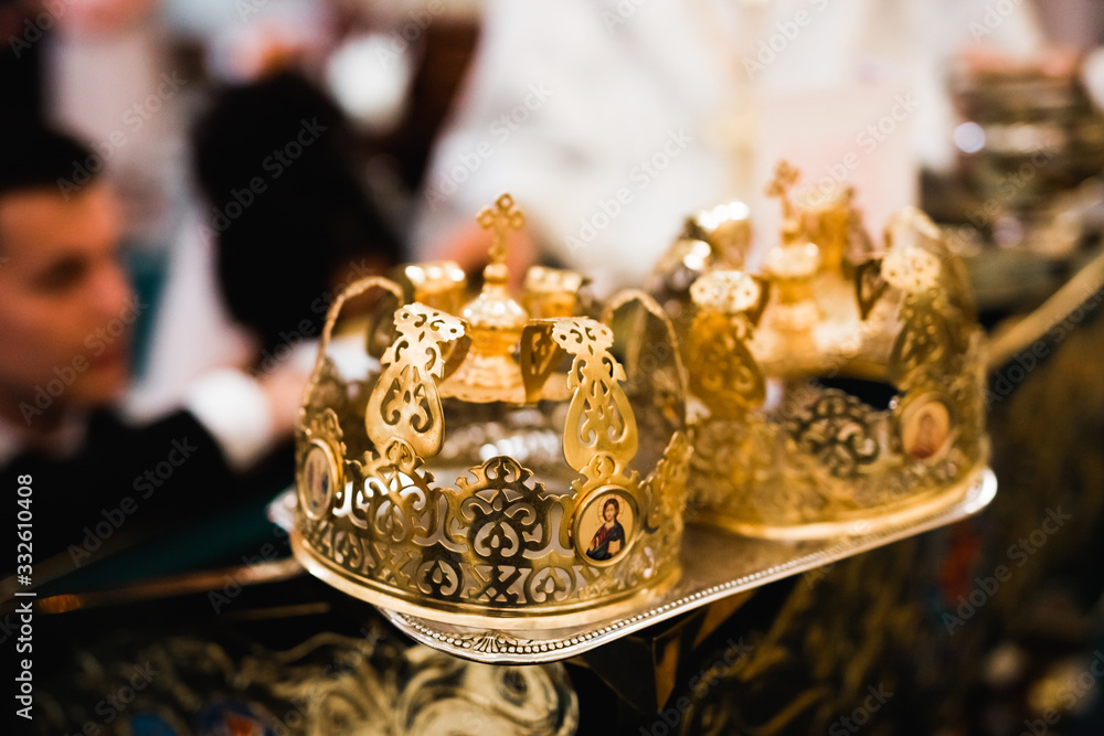 Golden crowns lying on the table in church Golden crowns lying on the table in church
