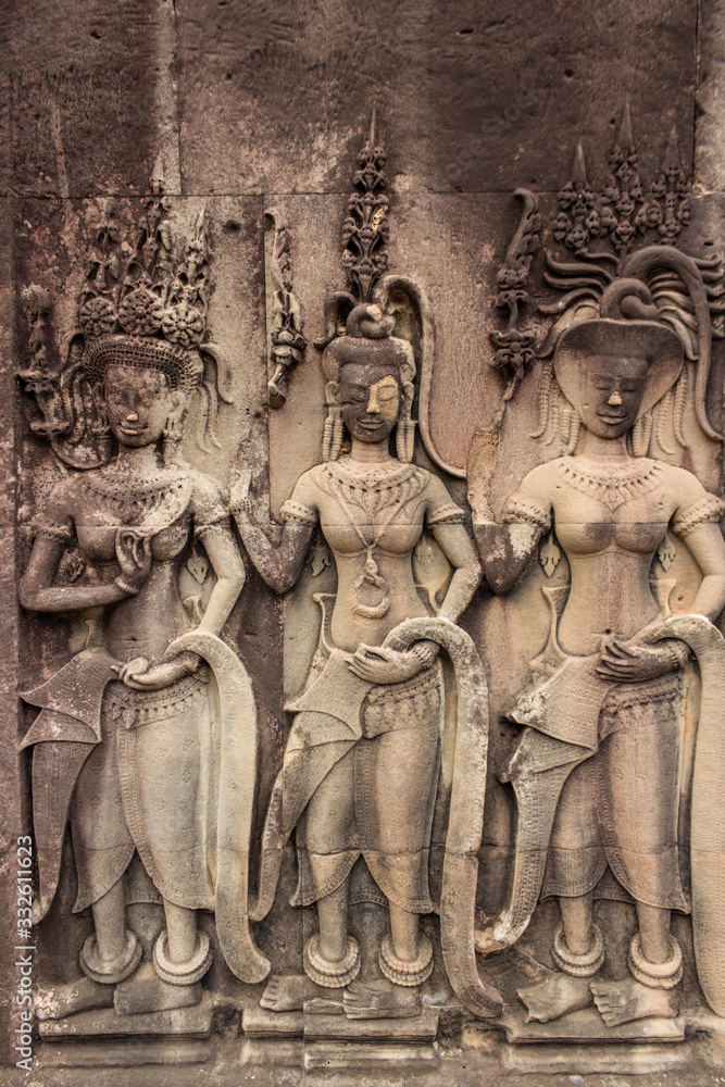 Ancient Khmer carving/relief of goddess. Wall of Temple Angkor wat, Siem Reap, Cambodia.