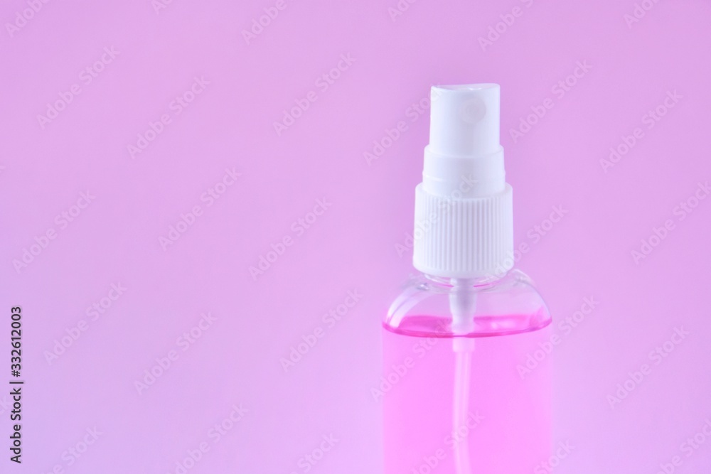 Antiseptic hand sanitizer on pink background. alcohol sanitizers or alcohol gel for hand hygiene corona virus protection. Antibacterial liquid against covid-19, virus, flu coronavirus. Antiseptic hand sanitizer on pink background. alcohol sanitizers or alcohol gel for hand hygiene corona virus protection. Antibacterial liquid against covid-19, virus, flu coronavirus.
