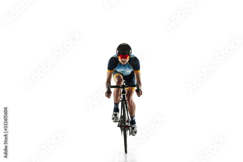 Fototapeta Naklejka Na Ścianę i Meble -  Triathlon male athlete cycle training isolated on white studio background. Caucasian fit triathlete practicing in cycling wearing sports equipment. Concept of healthy lifestyle, sport, action, motion.