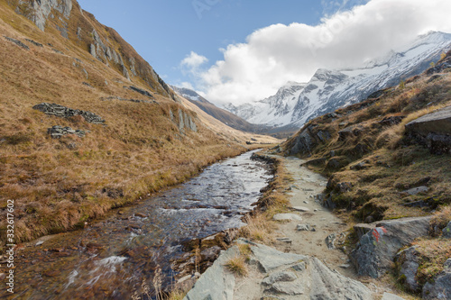 walking at fall in a mountain valley