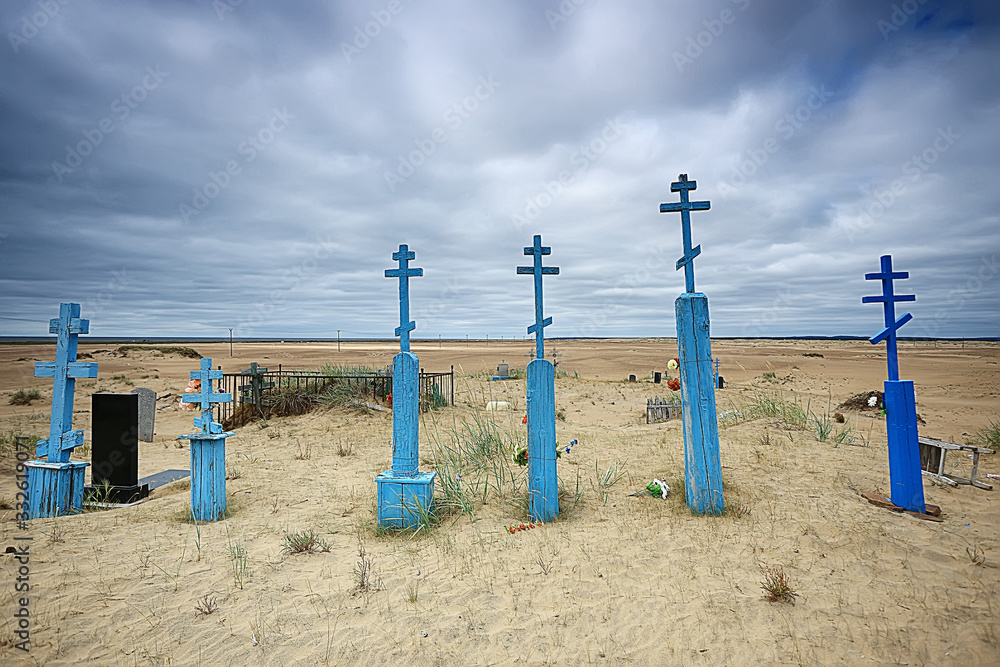 grave crosses in a desert cemetery / climate change concept warming, disaster, apocalypse, Christian cemetery grave crosses in a desert cemetery / climate change concept warming, disaster, apocalypse, Christian cemetery