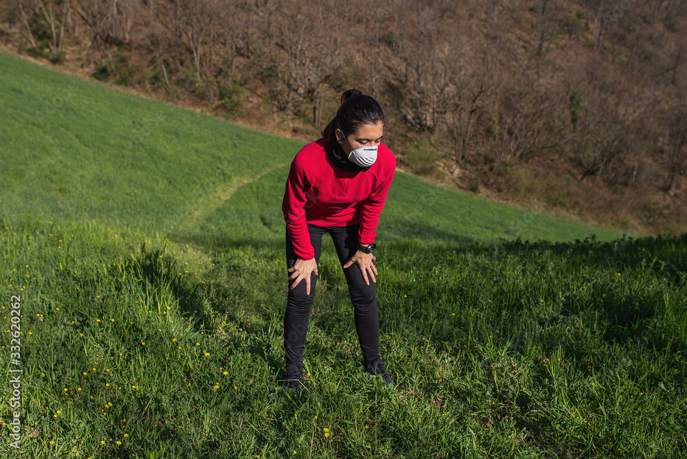 woman playing sport with a mask during coronavirus
