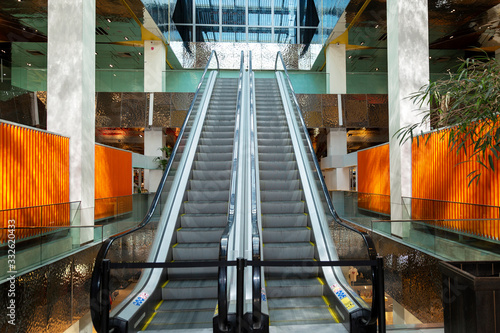 Photography Empty escalator in a beautiful shopping center.