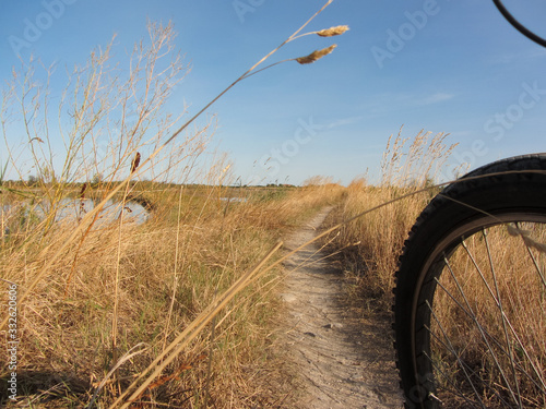 cycling in sunny day in the lagoon of Venice photo