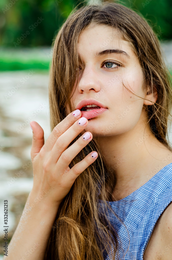 girl on the beach, enjoy and relax.  Young beautiful girl  on the beach. Girl with long hair at the beach. Beautiful face of a girl