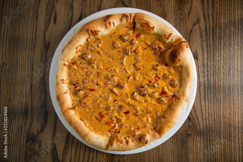 Pizza with cheese and beefs...