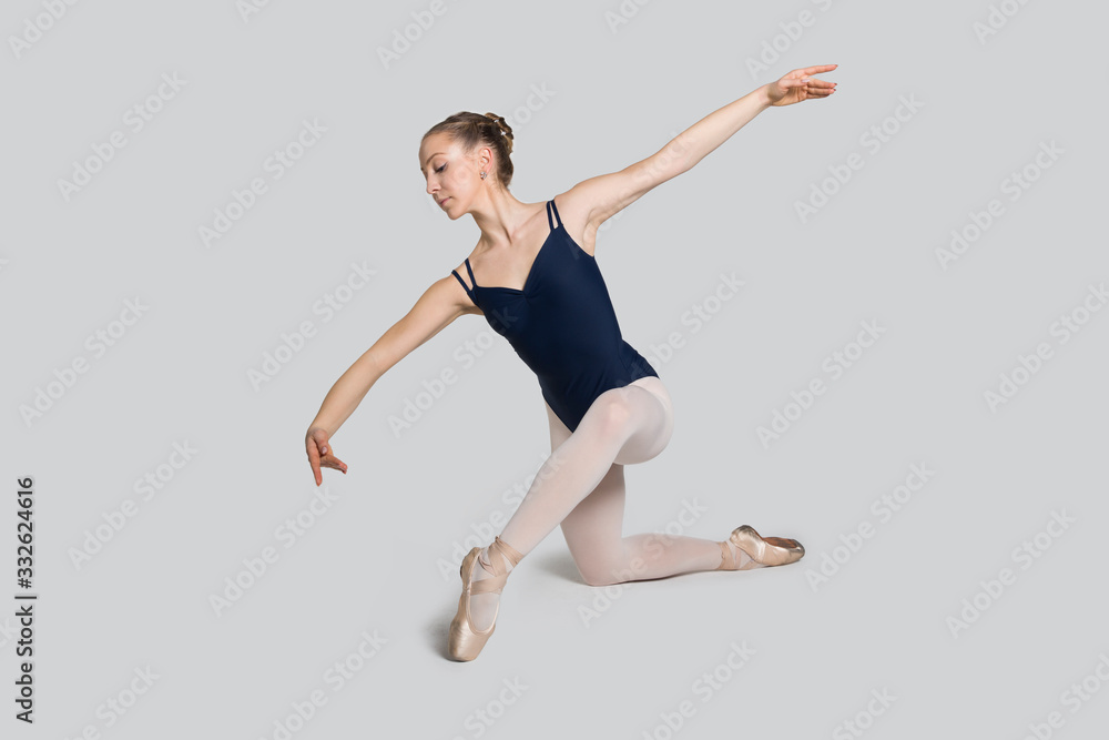 Young ballerina practising ballet moves