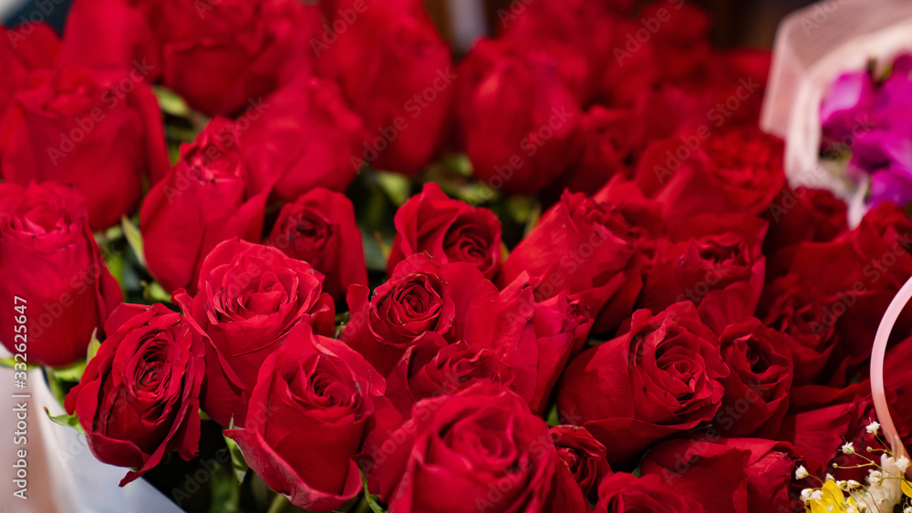 large bouquet from variety of vibrant red roses. large bouquet from variety of vibrant red roses.