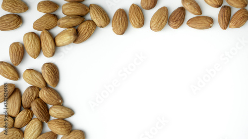 Almond nuts isolated with white background.