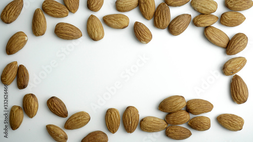 Almond nuts isolated with white background.
