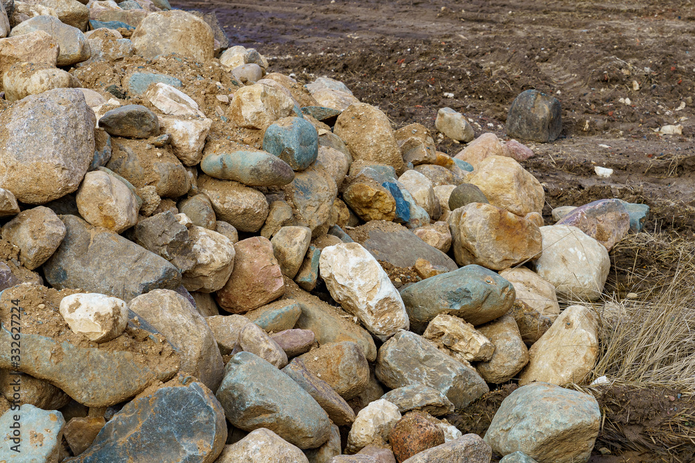 pile of cobblestones with sand