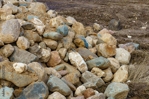 pile of cobblestones with sand