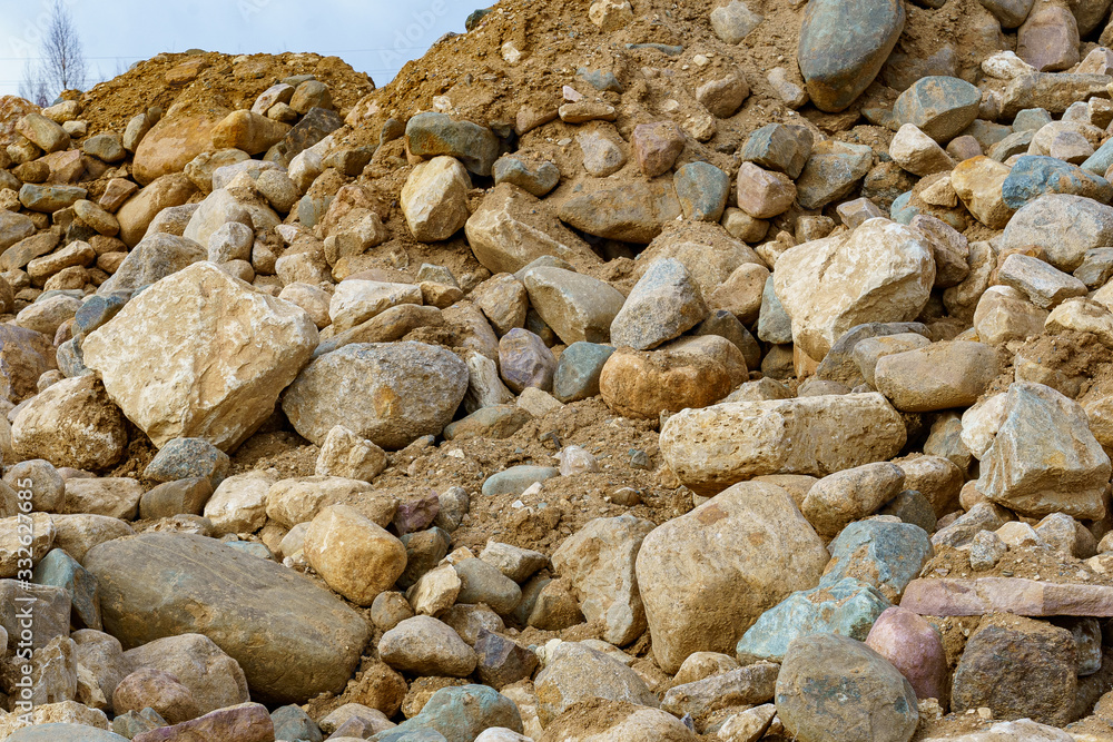 pile of cobblestones with sand