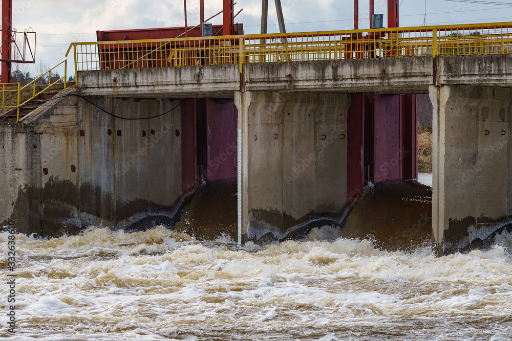 hydraulic structure, a dam through which a river flows
