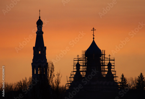 Ancient Orthodox Church. Restoration. The silhouette of the Orthodox Cathedral at sunrise