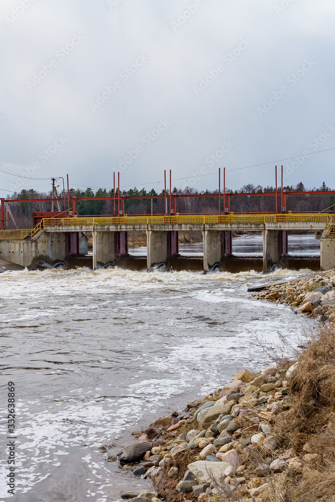 hydraulic structure, a dam through which a river flows