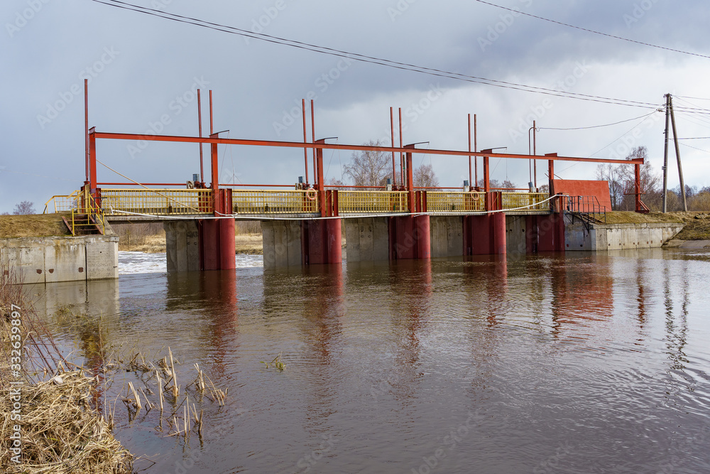 hydraulic structure, a dam through which a river flows
