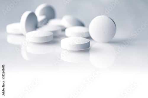 white pills, medicine for the disease