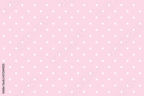 Polka dot seamless pattern. White dots on pink background. © mars58