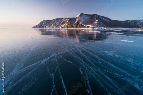 Fototapeta Naklejka Na Ścianę i Meble -  Beautiful morning sunrise at Uzury bay, Baikal frozen lake in winter season, Siberia, Russia
