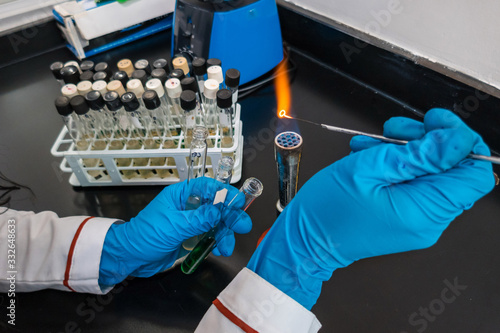 Foto heating handle with bunsen burner for microbiological inoculation