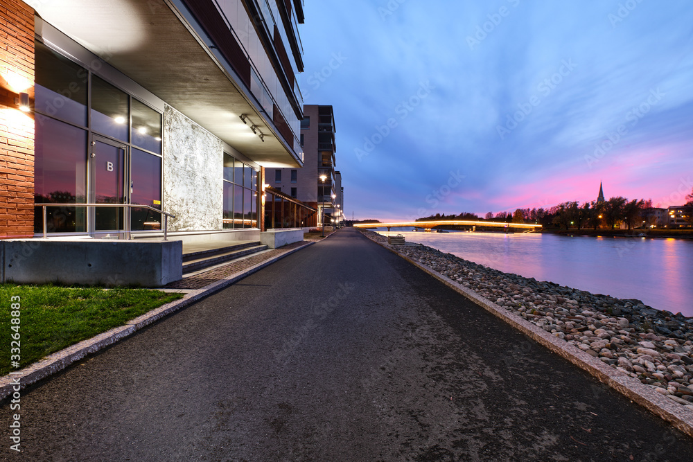 Pielisjoki River Embankment in the evening in Joensuu, Finland.