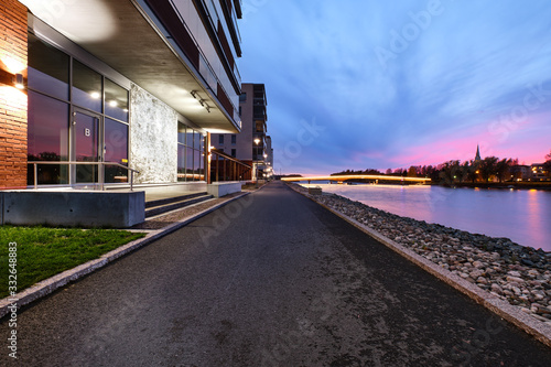 Obraz na płótnie Pielisjoki River Embankment in the evening in Joensuu, Finland. w salonie