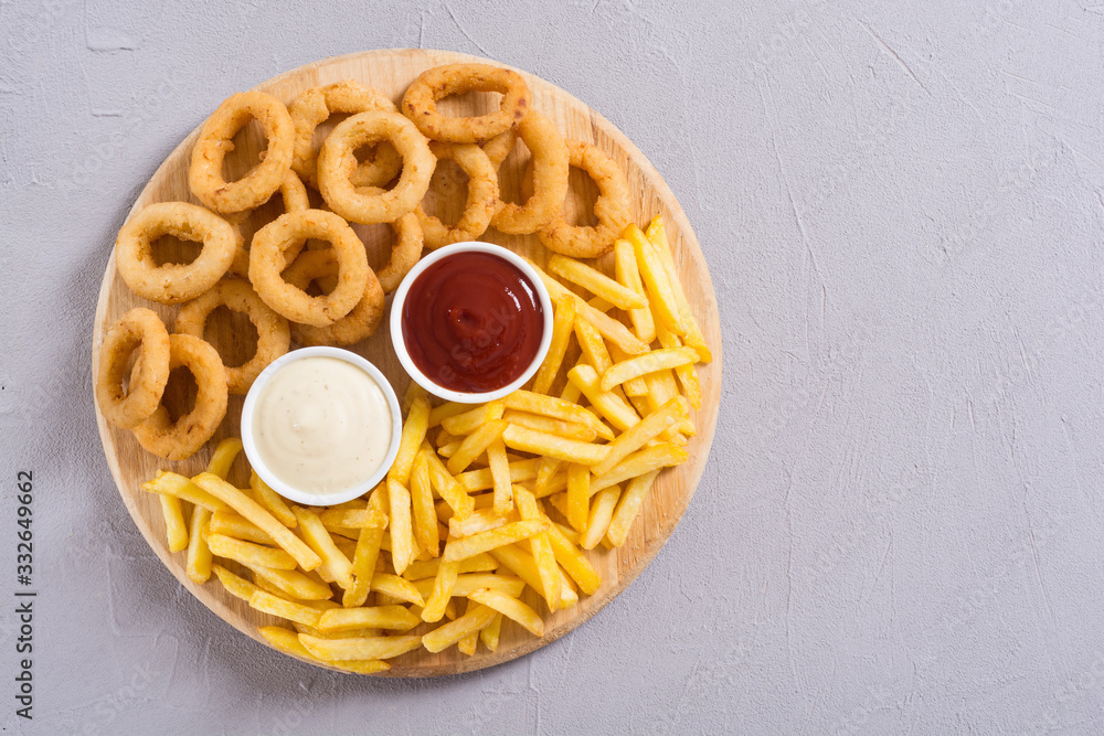 French fries and onion rings with sauces Stock Photo Adobe Stock