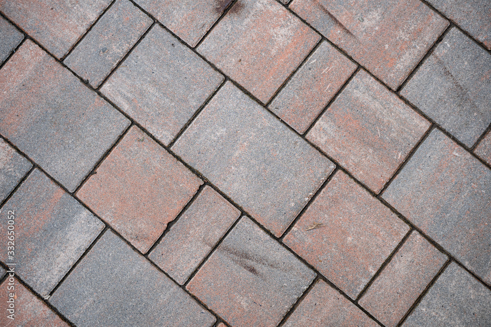 Background image of neatly laid paving tiles for the exterior