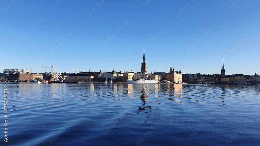 Panoramic view of the sea bay and the city against the blue sky. Spring Sweden