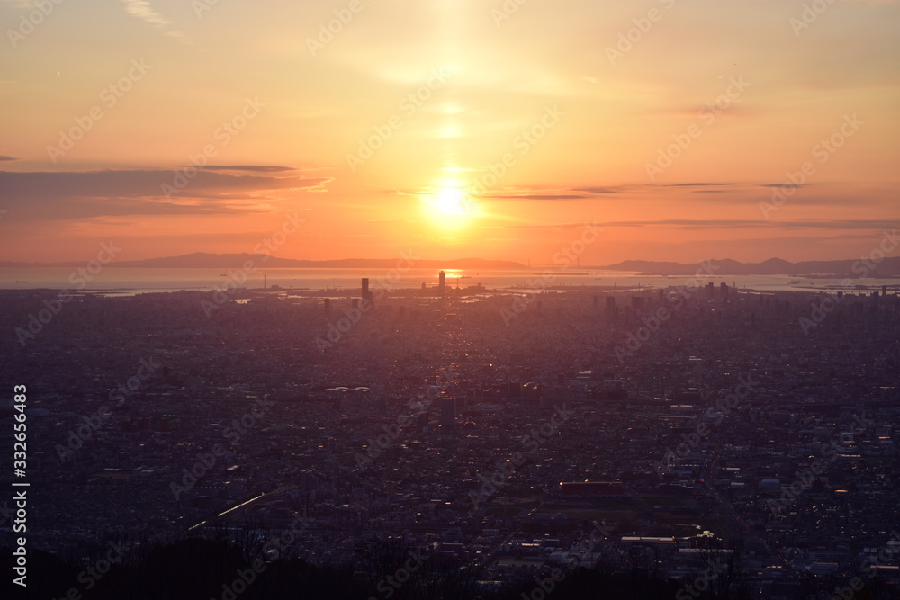 Obraz premium sunset over the sea with city view