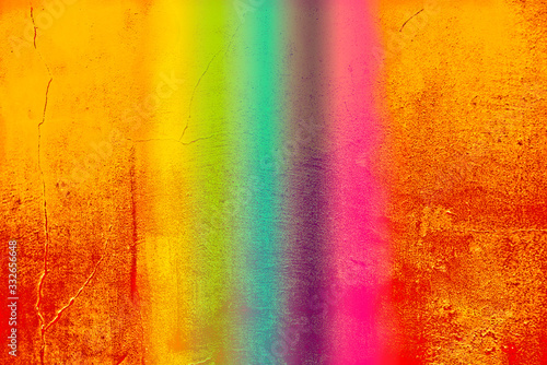 Obraz na płótnie Orange wall with rainbow stripes in the middle