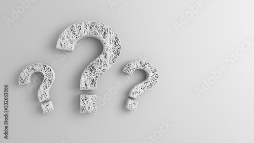 Photos A plurality of thin filaments intertwined in the shape of a question mark on white background
