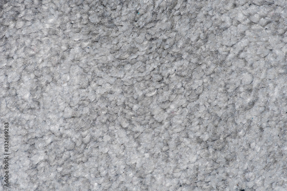 Carpet texture in different tones of grey soft and fluffy synthetic fabric structure Carpet texture in different tones of grey soft and fluffy synthetic fabric structure