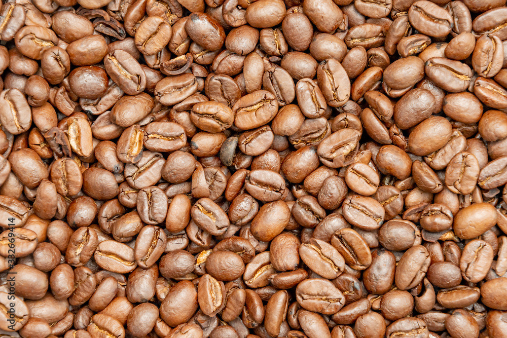 Coffee beans roasted dark brown seeds texture or background Coffee beans roasted dark brown seeds texture or background