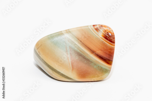 Colorful gemstone stripes in red green orange yellow and brown on white background