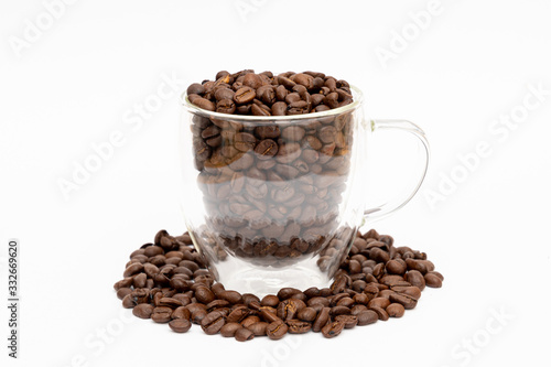 Glass thermos insulating cup transparent filled with and between coffee beans