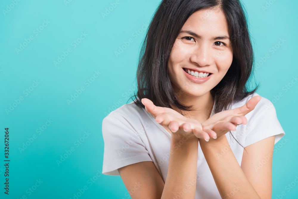 woman smile standing wear, She blowing air kiss something on palms woman smile standing wear, She blowing air kiss something on palms