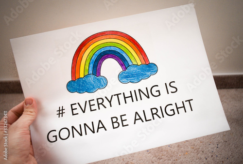 Everything will be fine, is gonna be alright in hand drawing letters and a rainbow with clouds drawn by a child. quarantine corona virus flu, the covid 19.