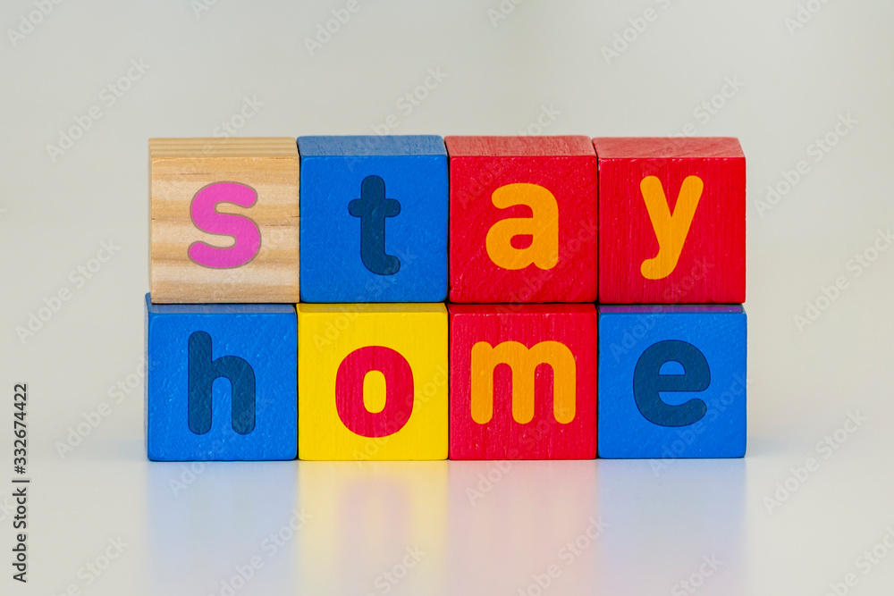 Stay home inscription from blocks, coronavirus prevention Stay home inscription from blocks, coronavirus prevention