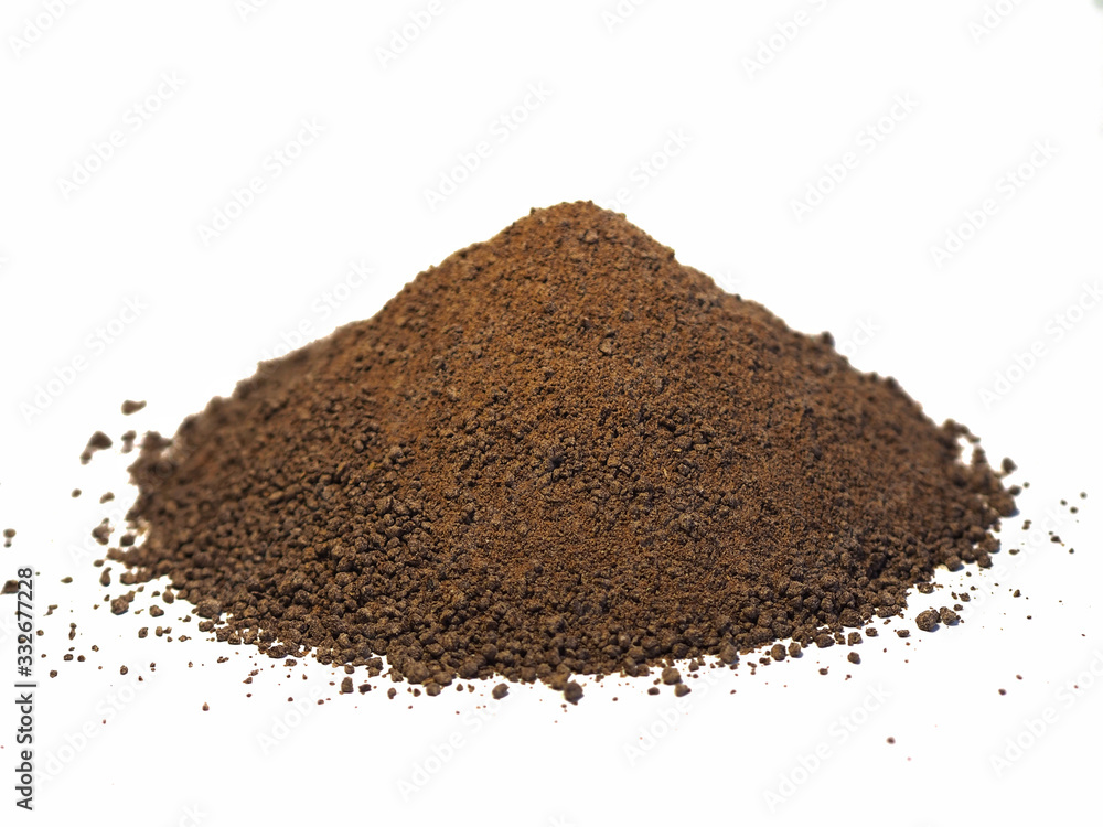 linseed cake on white background renewable high nutrition animal feed (Linum usitatissimum) linseed cake on white background renewable high nutrition animal feed (Linum usitatissimum)