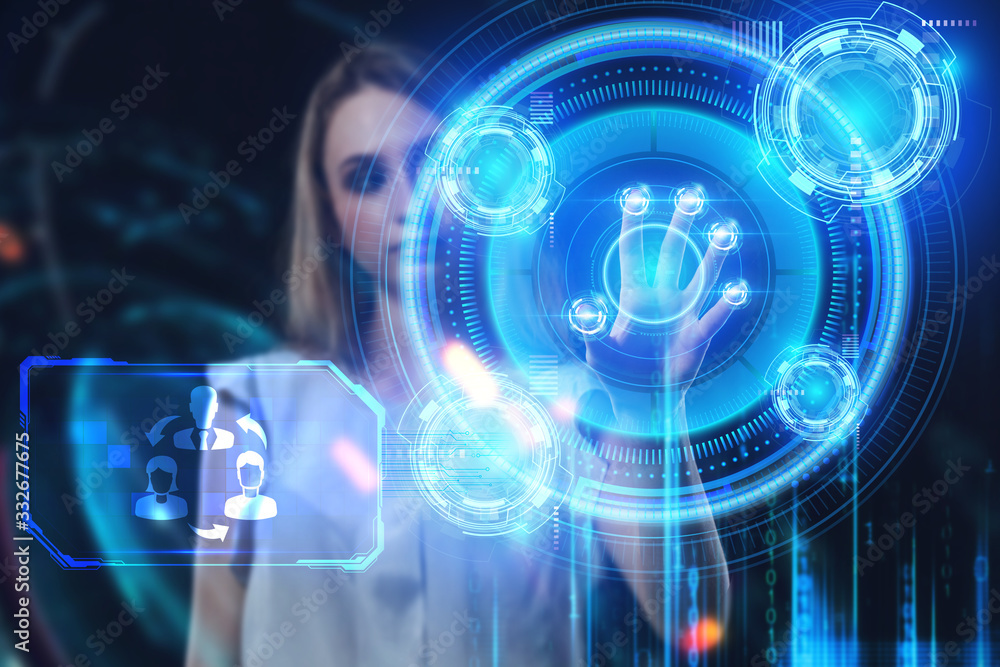 Business, Technology, Internet and network concept. Young businessman working on a virtual screen of the future and sees the inscription: Business, Technology, Internet and network concept. Young businessman working on a virtual screen of the future and sees the inscription: