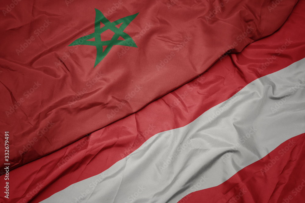 waving colorful flag of austria and national flag of morocco. waving colorful flag of austria and national flag of morocco.