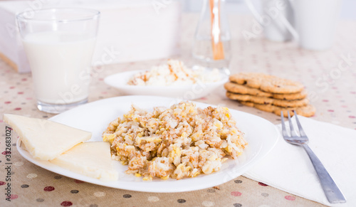 plate with cereal porridge for breakfast photo