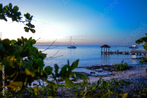 Cozumel blue sunset pier © Jose