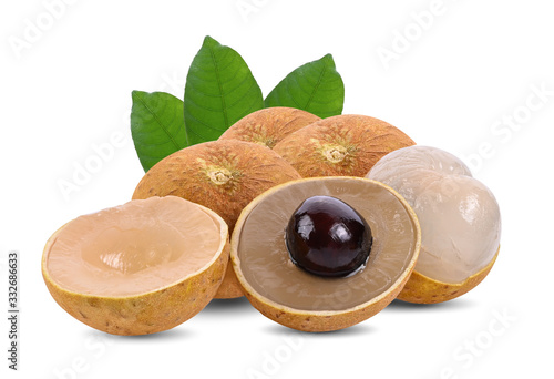 Fresh longan with leaves isolated on a white background photo