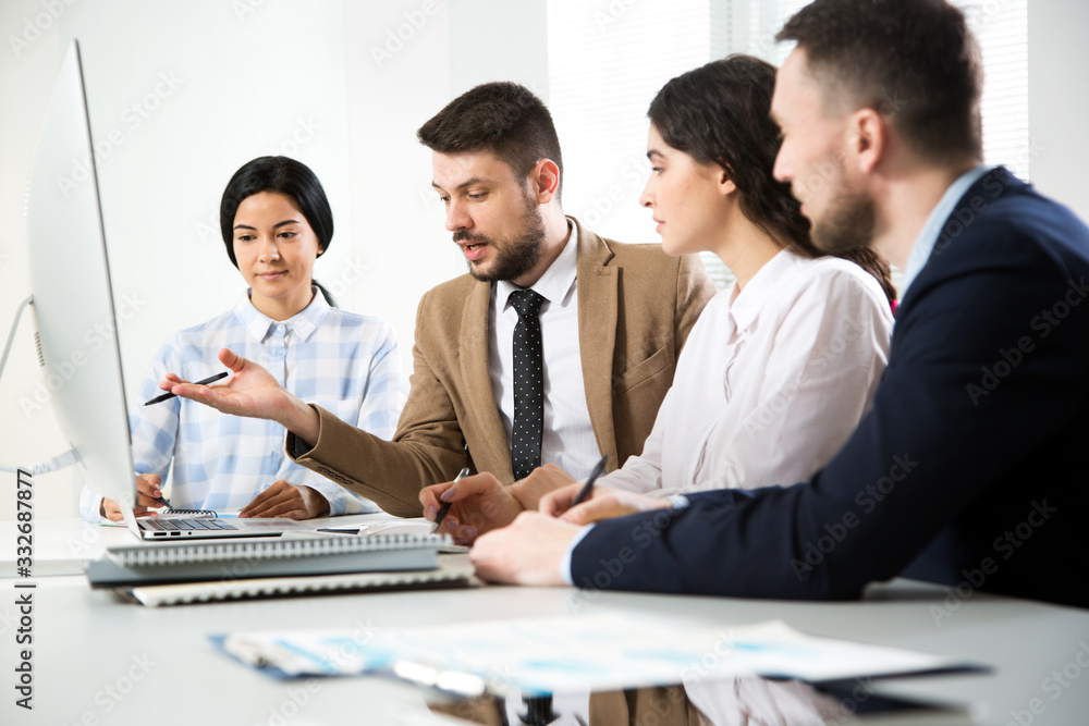 Business people working together in the office Business people working together in the office